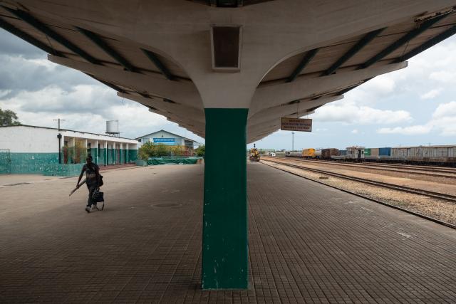 (251119) -- LUSAKA, Nov. 19, 2025 (Xinhua) -- A man walks past the platform of New Kapiri Mposhi Railway Station in Central Province, Zambia, Nov. 14, 2025. TO GO WITH "Feature: Tazara Railway enters new chapter of China-Africa friendship" (Xinhua/Peng Lijun)