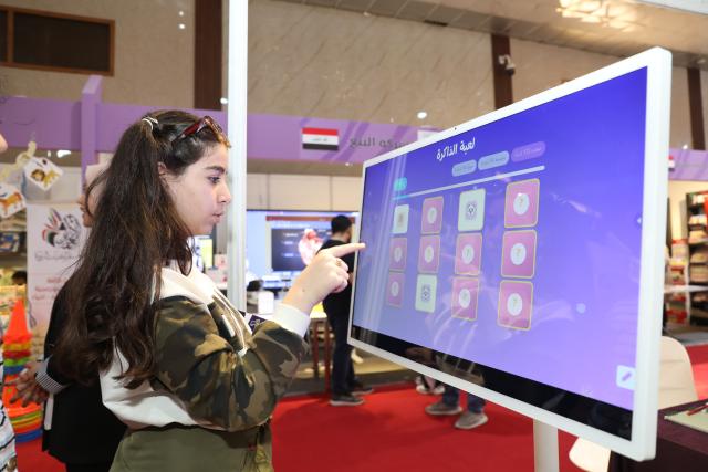 (251119) -- BAGHDAD, Nov. 19, 2025 (Xinhua) -- A girl participates in Iraq International Children's Festival in Baghdad, Iraq, Nov. 19, 2025. The forth edition of the Iraq International Children's Festival kicked off on Wednesday and will last 10 days. (Xinhua/Khalil Dawood)