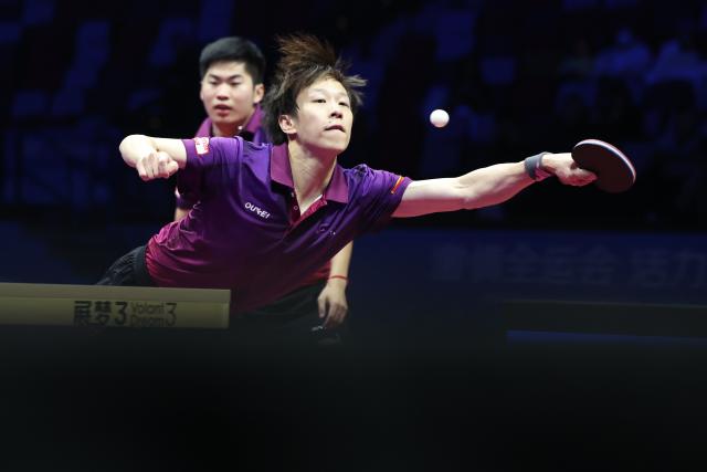 (251120) -- MACAO, Nov. 20, 2025 (Xinhua) -- Lin Gaoyuan (front)/Yuan Xuansong of Guangdong compete against Xu Yingbin/Cao Wei of Heilongjiang during the men's team bronze medal match of table tennis between Guangdong and Heilongjiang at China's 15th National Games in Macao, south China, Nov. 20, 2025. (Xinhua/Chen Bin)
