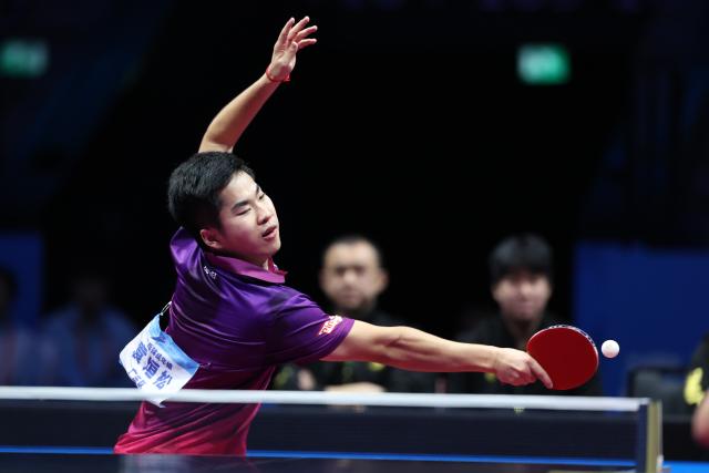 (251120) -- MACAO, Nov. 20, 2025 (Xinhua) -- Yuan Xuansong of Guangdong hits a return in the match against Cao Wei of Heilongjiang during the men's team bronze medal match of table tennis between Guangdong and Heilongjiang at China's 15th National Games in Macao, south China, Nov. 20, 2025. (Xinhua/Chen Bin)