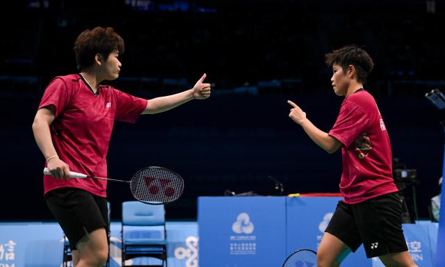 (251120) -- SHENZHEN, Nov. 20, 2025 (Xinhua) -- Huang Dongping/Tan Ning (L) celebrate scoring during the women's doubles final of badminton between Huang Dongping/Tan Ning of Fujian and Zheng Yu/Zhang Shuxian of Sichuan at China's 15th National Games in Shenzhen, south China's Guangdong Province, Nov. 20, 2025. (Xinhua/Lian Zhen)