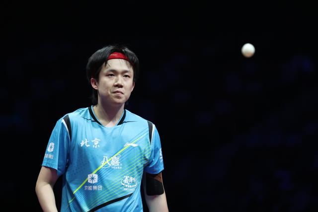 (251120) -- MACAO, Nov. 20, 2025 (Xinhua) -- Wang Chuqin of Beijing reacts in the match against Fan Zhendong of Shanghai during the men's team final of table tennis between Beijing and Shanghai at China's 15th National Games in Macao, south China, Nov. 20, 2025. (Xinhua/Chen Bin)