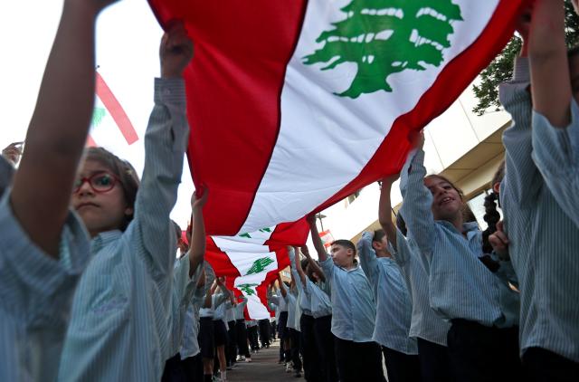 (251120) -- BEIRUT, Nov. 20, 2025 (Xinhua) -- Students participate in a celebration event for Lebanon's upcoming Independence Day in downtown Beirut, Lebanon, Nov. 20, 2025. Lebanon's Independence Day falls on Nov. 22. (Xinhua/Bilal Jawich)
