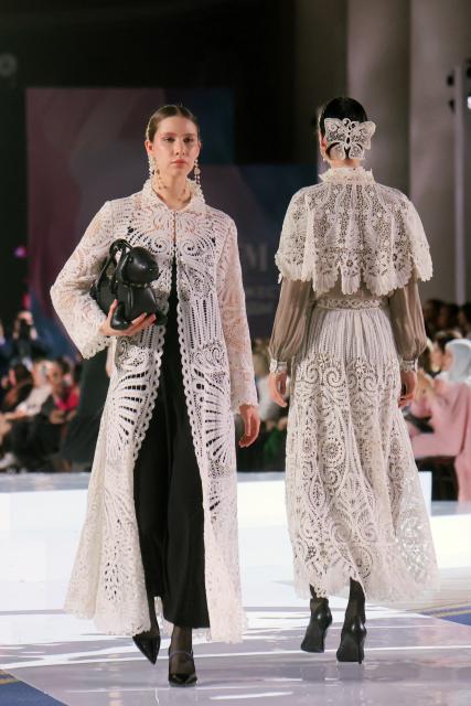 (251121) -- ST. PETERSBURG, Nov. 21, 2025 (Xinhua) -- Models present creations at the CIS fashion show at the Tauride Palace in St. Petersburg, Russia, on Nov. 20, 2025.
  Designers from 32 countries presented their works to the audience at the event on Thursday. (Photo by Irina Motina/Xinhua)