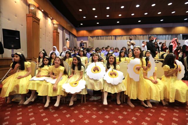 (251121) -- AMMAN, Nov. 21, 2025 (Xinhua) -- Children take part in a World Children's Day celebration in Amman, Jordan, Nov. 20, 2025.
  A celebration featuring musical performance, dance, and fashion show was held here on Thursday to mark World Children's Day. (Photo by Mohammad Abu Ghosh/Xinhua)