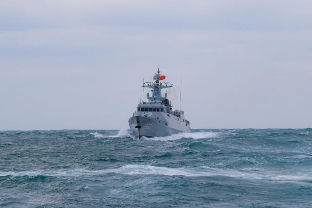 (251121) -- GUANGZHOU, Nov. 21, 2025 (Xinhua) -- A Chinese vessel attends the 39th joint patrol of Chinese and Vietnamese navies in the Beibu Gulf, on Nov. 19, 2025. Two fleets from the Chinese and Vietnamese navies conducted their 39th joint patrol in the waters of the Beibu Gulf from Nov. 19 to 20, in accordance with a relevant agreement and annual plans between the two sides. (Photo by Li Zhengsong/Xinhua)