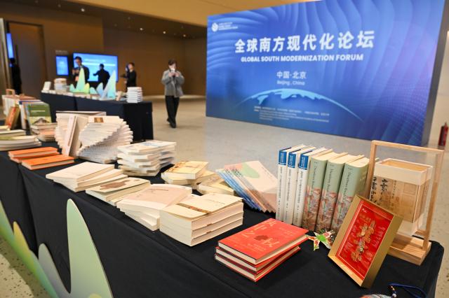 (251121) -- BEIJING, Nov. 21, 2025 (Xinhua) -- This photo taken on Nov. 21, 2025 shows a scene at the exhibition area for achievements at the Global South Modernization Forum in Beijing, capital of China. Themed "Working Together to Advance Modernization: A Shared Vision and The Path to Development," the forum was held here on Friday. (Xinhua/Jin Liangkuai)