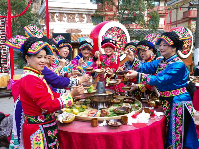 (251121) -- WENCHUAN, Nov. 21, 2025 (Xinhua) -- Residents attend a group banquet in celebration of the Qiang New Year in Wenchuan County, Aba Tibetan and Qiang Autonomous Prefecture, southwest China's Sichuan Province, Nov. 20, 2025. An event celebrating the Qiang New Year was held here from Wednesday to Thursday, featuring a series of activities. (Photo by Lan Hongguang/Xinhua)