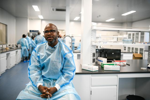 (251121) -- ADDIS ABABA, Nov. 21, 2025 (Xinhua) -- Kone Klima Marcel, a microbiologist at the National Institute of Public Health of Mali, speaks to Xinhua in a laboratory in Addis Ababa, Ethiopia's capital, Nov. 20, 2025. TO GO WITH: "Feature: African experts gain genome sequencing skills through China-supported training" (Photo by Michael Tewelde/Xinhua)