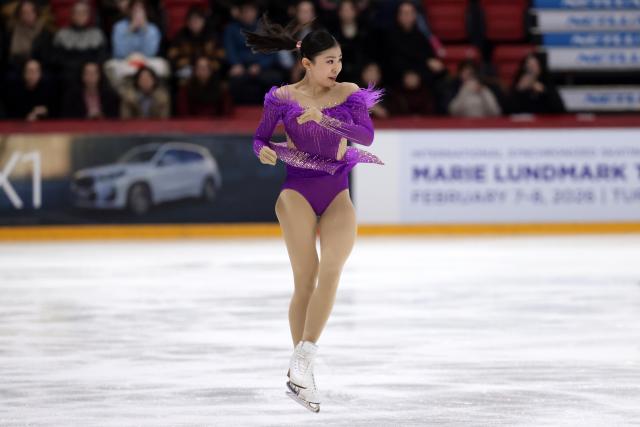 (251122) -- HELSINKI, Nov. 22, 2025 (Xinhua) -- Chiba Mone of Japan performs during the women's short program at ISU Figure Skating Grand Prix 2025 in Helsinki, Finland, Nov. 21, 2025. (Photo by Matti Matikainen/Xinhua)