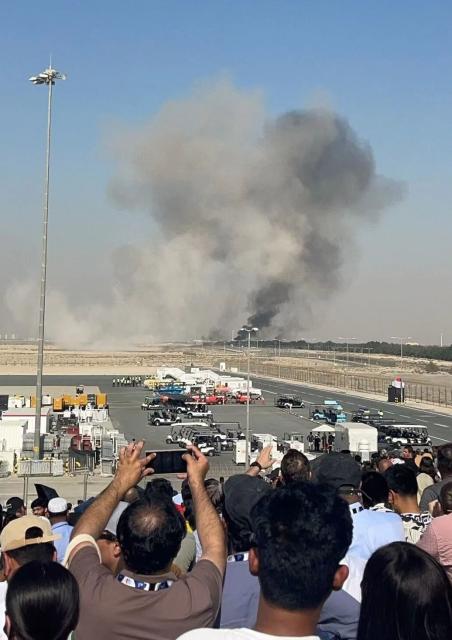 (251122) -- BEIJING, Nov. 22, 2025 (Xinhua) -- Smoke billows from the site of an aircraft crash during a demonstration at the Dubai Airshow in Dubai, the United Arab Emirates (UAE), Nov. 21, 2025. A Tejas light combat aircraft of the Indian Air Force crashed Friday during an aerial demonstration at the Dubai Airshow, killing the pilot, according to the Ministry of Defense of the United Arab Emirates (UAE). (Xinhua)