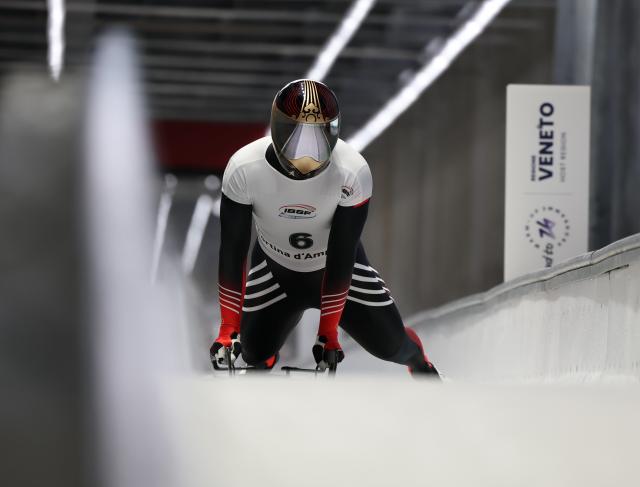 (251122) -- CORTINA D'AMPEZZO, Nov. 22, 2025 (Xinhua) -- Chen Wenhao of China competes during the ISBF World Cup Men's Skeleton match in Cortina D'Ampezzo, Italy, Nov. 21, 2025. (Xinhua/Li Jing)
