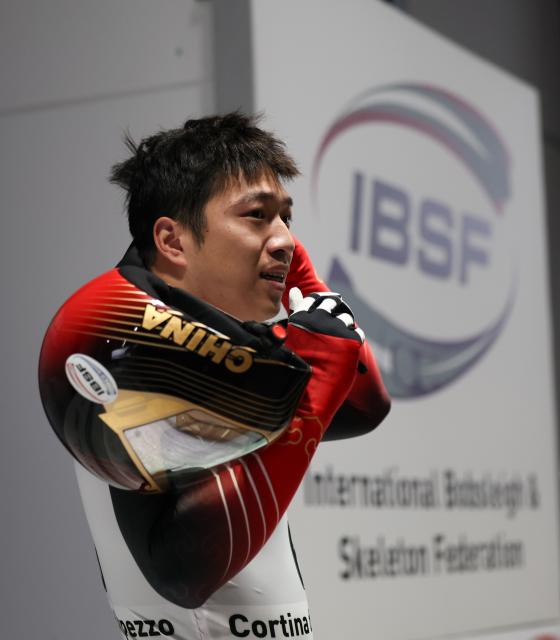 (251122) -- CORTINA D'AMPEZZO, Nov. 22, 2025 (Xinhua) -- Chen Wenhao of China reacts after the ISBF World Cup Men's Skeleton match in Cortina D'Ampezzo, Italy, Nov. 21, 2025. (Xinhua/Li Jing)