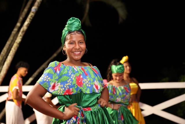 (251122) -- PUERTO CABEZAS, Nov. 22, 2025 (Xinhua) -- This photo taken on Nov. 18, 2025 shows people performing a local dance in Puerto Cabezas, in North Caribbean Coast Autonomous Region, Nicaragua. Puerto Cabezas, located on Nicaragua's eastern Caribbean coast, serves as the capital of the North Caribbean Coast Autonomous Region (RACCN). This distinctive port city features a hot, humid climate, scenic landscapes, and abundant natural resources. (Xinhua/Li Mengxin)