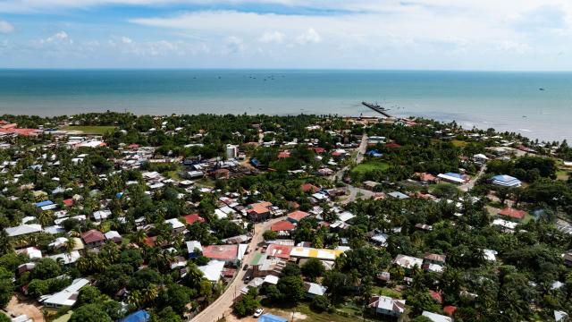 (251122) -- PUERTO CABEZAS, Nov. 22, 2025 (Xinhua) -- This aerial drone photo taken on Nov. 20, 2025 shows a city view of Puerto Cabezas, in North Caribbean Coast Autonomous Region, Nicaragua. Puerto Cabezas, located on Nicaragua's eastern Caribbean coast, serves as the capital of the North Caribbean Coast Autonomous Region (RACCN). This distinctive port city features a hot, humid climate, scenic landscapes, and abundant natural resources. (Xinhua/Li Mengxin)