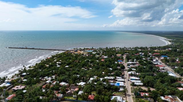 (251122) -- PUERTO CABEZAS, Nov. 22, 2025 (Xinhua) -- This aerial drone photo taken on Nov. 20, 2025 shows a city view of Puerto Cabezas, in North Caribbean Coast Autonomous Region, Nicaragua. Puerto Cabezas, located on Nicaragua's eastern Caribbean coast, serves as the capital of the North Caribbean Coast Autonomous Region (RACCN). This distinctive port city features a hot, humid climate, scenic landscapes, and abundant natural resources. (Xinhua/Li Mengxin)