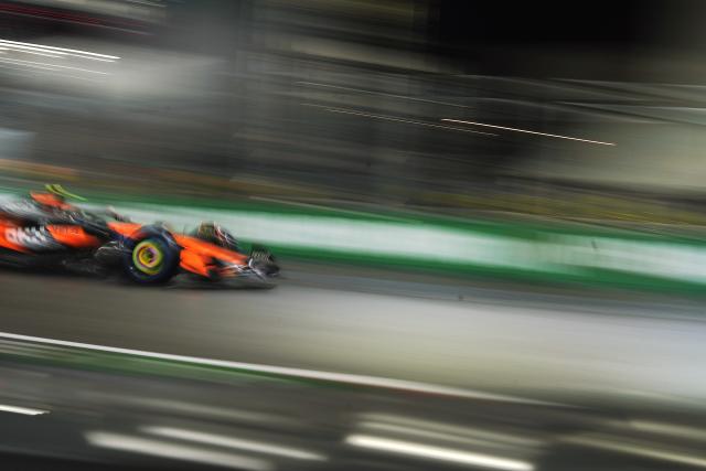 (251122) -- LAS VEGAS, Nov. 22, 2025 (Xinhua) -- McLaren's British driver Lando Norris competes during the qualifying session of the 2025 Formula One U.S. Grand Prix at Las Vegas Circuit, in Las Vegas, the United States, Nov. 21, 2025. (Xinhua/Wu Xiaoling)