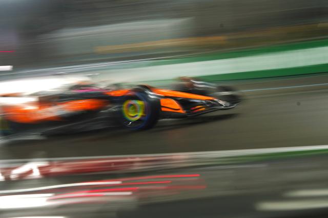 (251122) -- LAS VEGAS, Nov. 22, 2025 (Xinhua) -- McLaren's British driver Lando Norris competes during the qualifying session of the 2025 Formula One U.S. Grand Prix at Las Vegas Circuit, in Las Vegas, the United States, Nov. 21, 2025. (Xinhua/Wu Xiaoling)