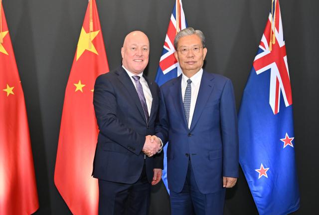 (251122) -- WELLINGTON, Nov. 22, 2025 (Xinhua) -- Zhao Leji, chairman of China's National People's Congress Standing Committee, meets with New Zealand Prime Minister Christopher Luxon in Auckland, New Zealand, Nov. 20, 2025. Zhao paid an official visit to the country from Wednesday to Saturday at the invitation of Speaker of the New Zealand House of Representatives Gerry Brownlee. (Xinhua/Yue Yuewei)