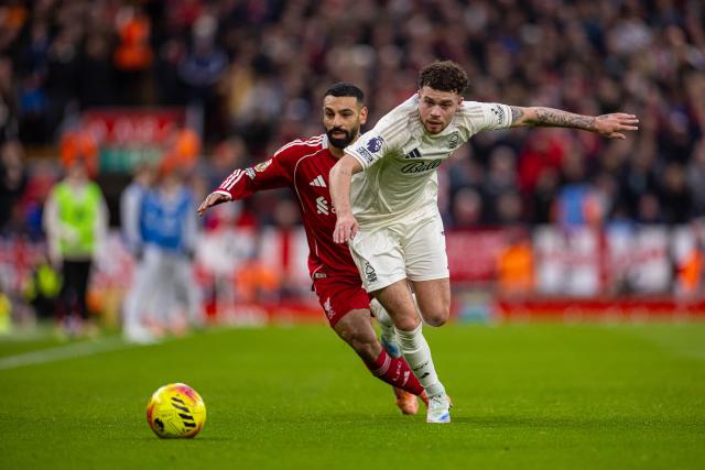 (251123) -- LONDON, Nov. 23, 2025 (Xinhua) -- Liverpool's Mohamed Salah (L) vies with Nottingham Forest's Neco Williams during the English Premier League match between Liverpool FC and Nottingham Forest FC in Liverpool, Britain, on Nov. 22, 2025. (Xinhua)
FOR EDITORIAL USE ONLY. NOT FOR SALE FOR MARKETING OR ADVERTISING CAMPAIGNS. NO USE WITH UNAUTHORIZED AUDIO, VIDEO, DATA, FIXTURE LISTS, CLUB/LEAGUE LOGOS OR "LIVE" SERVICES. ONLINE IN-MATCH USE LIMITED TO 45 IMAGES, NO VIDEO EMULATION. NO USE IN BETTING, GAMES OR SINGLE CLUB/LEAGUE/PLAYER PUBLICATIONS.
