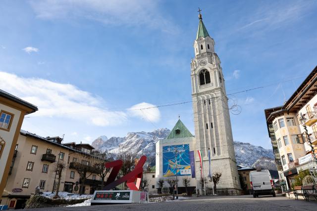 (251123) -- CORTINA D'AMPEZZO, Nov. 23, 2025 (Xinhua) -- This photo taken on Nov. 22, 2025 shows the countdown board of Milan-Cortina 2026 Olympic Winter Games, in Cortina D'Ampezzo, Italy. Located in Italy's northern region of Veneto, Cortina d'Ampezzo is famed for its beauty, ski resort and sporting legacy, beginning with the 1956 Olympic Winter Games and carrying through to Milan-Cortina 2026. (Xinhua/Li Jing)