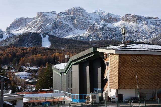(251123) -- CORTINA D'AMPEZZO, Nov. 23, 2025 (Xinhua) -- This photo taken on Nov. 22, 2025 shows the Cortina Curling Olympic Stadium in Cortina D'Ampezzo, Italy. Located in Italy's northern region of Veneto, Cortina d'Ampezzo is famed for its beauty, ski resort and sporting legacy, beginning with the 1956 Olympic Winter Games and carrying through to Milan-Cortina 2026. (Xinhua/Li Jing)