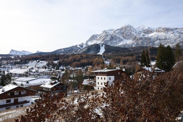 (251123) -- CORTINA D'AMPEZZO, Nov. 23, 2025 (Xinhua) -- This photo taken on Nov. 22, 2025 shows a wintertime scenery of Cortina D'Ampezzo, Italy. Located in Italy's northern region of Veneto, Cortina d'Ampezzo is famed for its beauty, ski resort and sporting legacy, beginning with the 1956 Olympic Winter Games and carrying through to Milan-Cortina 2026. (Xinhua/Li Jing)
