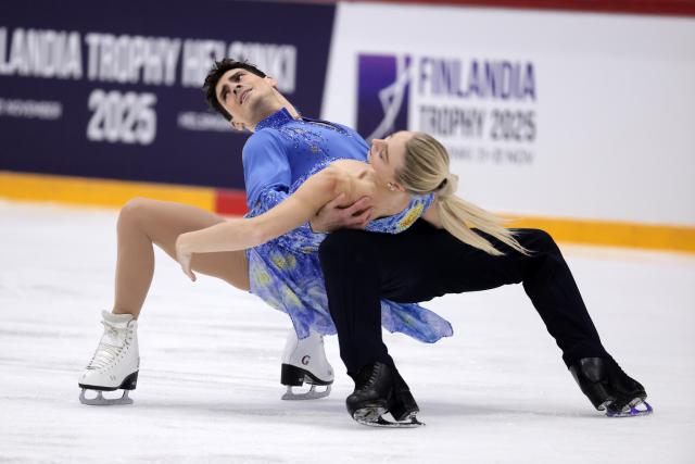 (251123) -- HELSINKI, Nov. 23, 2025 (Xinhua) -- Piper Gilles (R)/Paul Poirier of Canada compete during the ice dance free dance at the ISU Grand Prix of Figure Skating event Finlandia Trophy 2025 in Helsinki, Finland, Nov. 22, 2025. (Photo by Matti Matikainen/Xinhua)