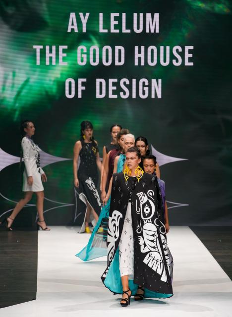 (251123) -- VANCOUVER, Nov. 23, 2025 (Xinhua) -- Models present creations by Ay Lelum Sparrow during the closing night of Vancouver Indigenous Fashion Week 2025 in Vancouver, British Columbia, Canada, Nov. 22, 2025.
  The show highlighted the spirit of Canada's West Coast, marking the conclusion of the week-long celebration of indigenous culture and creativity. (Photo by Liang Sen/ Xinhua)