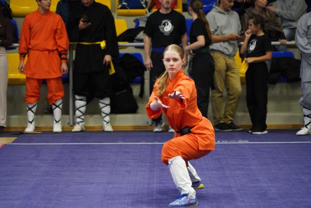(251123) -- FOT, Nov. 23, 2025 (Xinhua) -- Dora Timea Horvath competes in the 2025 Hungarian Wushu Championships in Fot, a small town in the Budapest region, Hungary, on Nov. 22, 2025. TO GO WITH "Wushu passion sweeps Budapest at Hungarian Championships" (Xinhua/Chen Hao)