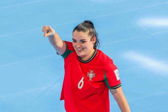 (251123) -- PASIG CITY, Nov. 23, 2025 (Xinhua) -- Kika of Portugal celebrates after scoring a goal during the Group C match between Portugal and Tanzania at the FIFA Futsal Women's World Cup 2025 in Pasig City, the Philippines, Nov. 23, 2025. (Xinhua/Rouelle Umali)