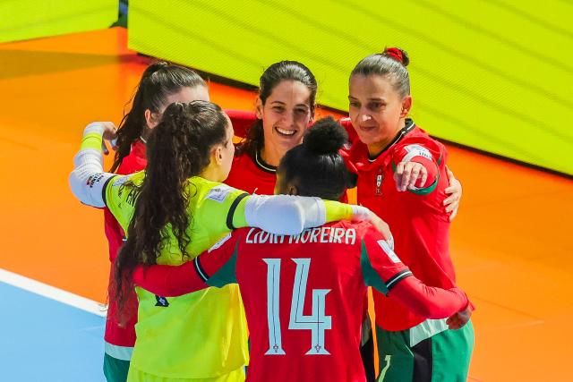 (251123) -- PASIG CITY, Nov. 23, 2025 (Xinhua) -- Players of Portugal celebrate after scoring a goal during the Group C match between Portugal and Tanzania at the FIFA Futsal Women's World Cup 2025 in Pasig City, the Philippines, Nov. 23, 2025. (Xinhua/Rouelle Umali)