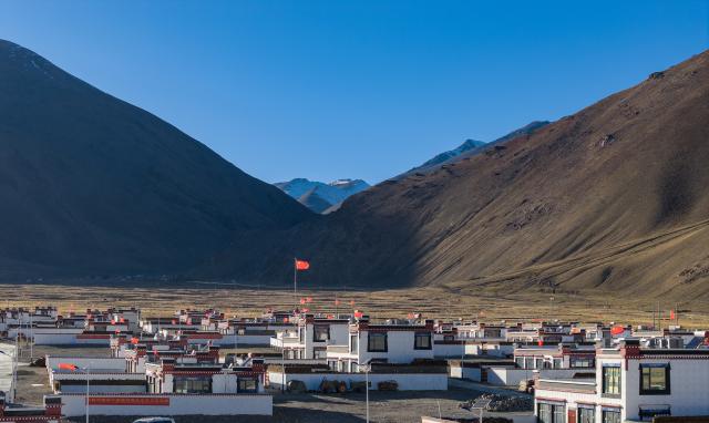 (251123) -- XIGAZE, Nov. 23, 2025 (Xinhua) -- A drone photo taken on Nov. 12, 2025 shows the reconstructed houses that have been delivered to residents at Yejiang Village of Dingri County, Xigaze City, southwest China's Xizang Autonomous Region. In early January, a 6.8-magnitude earthquake struck Dingri County in the city of Xigaze, leveling thousands of houses. 
   Ten months after the earthquake, more than 32,500 destroyed or damaged houses have been restored and handed over to affected residents, according to the authorities of Xigaze City. 
   In less than three days after the earthquake, Xizang rolled out a post-disaster reconstruction plan and kicked off the preliminary work, which included field survey, housing design and debris clearance.
   The restoration work covered 486 villages in seven counties, resulting in the reconstruction of more than 22,000 houses and the reinforcement of an additional 10,500 homes. The first batch of quake-affected residents have moved into new homes in August. (Xinhua/Jiang Fan)