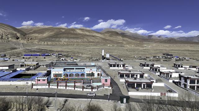 (251123) -- XIGAZE, Nov. 23, 2025 (Xinhua) -- A drone photo taken on Nov. 19, 2025 shows a view of Cuoang Village of Qulho Township in Dingri County, Xigaze City, southwest China's Xizang Autonomous Region. In early January, a 6.8-magnitude earthquake struck Dingri County in the city of Xigaze, leveling thousands of houses. 
   Ten months after the earthquake, more than 32,500 destroyed or damaged houses have been restored and handed over to affected residents, according to the authorities of Xigaze City. 
   In less than three days after the earthquake, Xizang rolled out a post-disaster reconstruction plan and kicked off the preliminary work, which included field survey, housing design and debris clearance.
   The restoration work covered 486 villages in seven counties, resulting in the reconstruction of more than 22,000 houses and the reinforcement of an additional 10,500 homes. The first batch of quake-affected residents have moved into new homes in August. (Xinhua/Ding Hongfa)