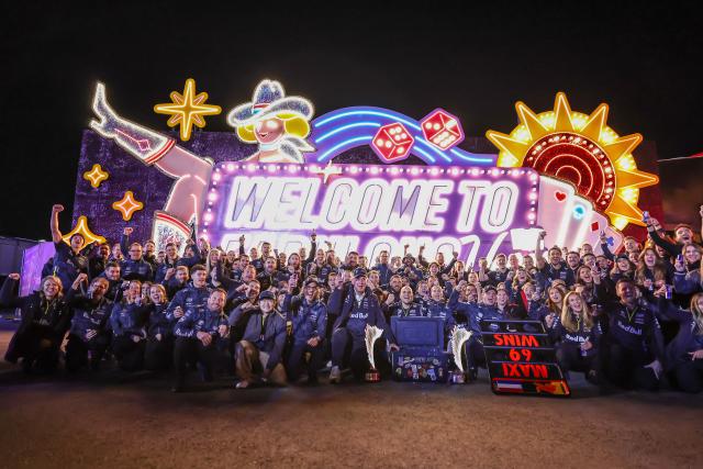 (251123) -- LAS VEGAS, Nov. 23, 2025 (Xinhua) -- Red Bull's Dutch driver Max Verstappenn celebrates with team members after the 2025 Formula One U.S. Grand Prix at Las Vegas Circuit, in Las Vegas, the United States, Nov. 22, 2025. (Photo by Song Haiyuan/Xinhua)