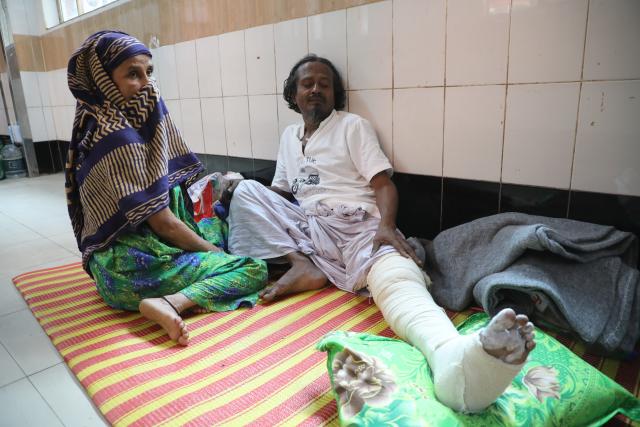 (251123) -- DHAKA, Nov. 23, 2025 (Xinhua) -- An injured person is seen at a hospital after an earthquake in Dhaka, Bangladesh, Nov. 22, 2025. At least 10 people were killed and hundreds of others injured on Friday after one of the biggest earthquakes in Bangladesh's recent history struck near the capital city Dhaka. (Photo by Habibur Rahman/Xinhua)
