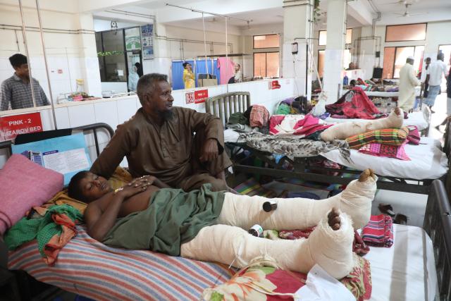 (251123) -- DHAKA, Nov. 23, 2025 (Xinhua) -- Injured people are seen at a hospital after an earthquake in Dhaka, Bangladesh, Nov. 22, 2025. At least 10 people were killed and hundreds of others injured on Friday after one of the biggest earthquakes in Bangladesh's recent history struck near the capital city Dhaka. (Photo by Habibur Rahman/Xinhua)