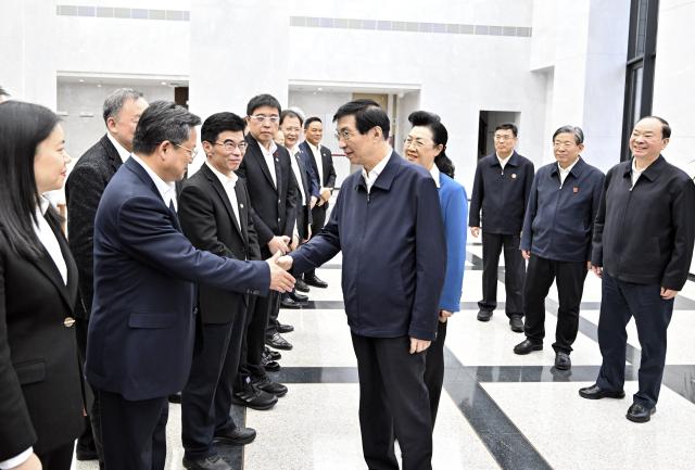 (251123) -- SHENZHEN, Nov. 23, 2025 (Xinhua) -- Wang Huning, a member of the Standing Committee of the Political Bureau of the Communist Party of China (CPC) Central Committee and chairman of the National Committee of the Chinese People's Political Consultative Conference (CPPCC), visits Shenzhen municipal committee of the CPPCC in Shenzhen, south China's Guangdong Province, Nov. 21, 2025. Wang made a fact-finding and research tour in Shenzhen and Huizhou, two cities located in southern China's Guangdong Province, from Nov. 21 to 23. (Xinhua/Yin Bogu)