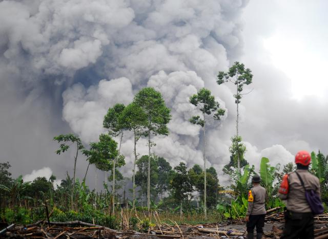 (251123) -- JAKARTA, Nov. 23, 2025 (Xinhua) -- This photo taken on Nov. 23, 2025 shows volcanic materials spewing from Mount Semeru in Lumajang regency, East Java, Indonesia. Indonesia's Semeru volcano erupted on Wednesday, prompting the country's volcanology agency to raise the alert level to the maximum. (Photo by Sahlan Kurniawan/Xinhua)