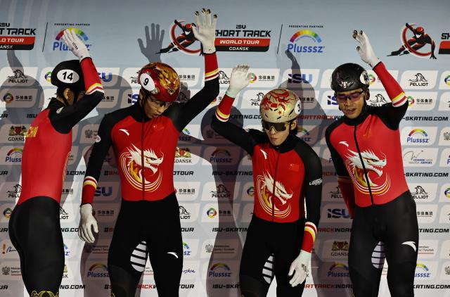 (251124) -- GDANSK, Nov. 24, 2025 (Xinhua) -- Team China react before the men's 500m relay Final A at the ISU Short Track World Tour #3 speed skating event in Gdansk, Poland, Nov. 23, 2025. (Xinhua/Gao Jing)
