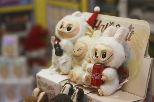 (251124) -- KABUL, Nov. 24, 2025 (Xinhua) -- This photo taken on Nov. 16, 2025 shows Labubu toys displayed at a local market in Kabul, Afghanistan. TO GO WITH "Feature: Beyond play: Labubu gains popularity in Afghanistan amid retail, cultural shifts" (Photo by Saifurahman Safi/Xinhua)