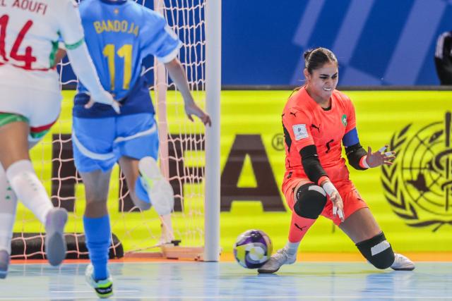 (251124) -- PASIG CITY, Nov. 24, 2025 (Xinhua) -- Goalkeeper Kawtar Bentaleb (R) of Morocco competes during the group A match between Morocco and the Philippines at the FIFA Futsal Women's World Cup 2025 in Pasig City, the Philippines, Nov. 24, 2025. (Xinhua/Rouelle Umali)
