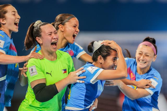 (251124) -- PASIG CITY, Nov. 24, 2025 (Xinhua) -- Players of the Philippines celebrate after scoring a goal during the group A match between Morocco and the Philippines at the FIFA Futsal Women's World Cup 2025 in Pasig City, the Philippines, Nov. 24, 2025. (Xinhua/Rouelle Umali)