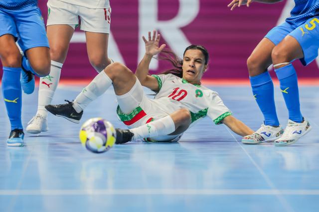 (251124) -- PASIG CITY, Nov. 24, 2025 (Xinhua) -- Drissia Korrych of Morocco competes during the group A match between Morocco and the Philippines at the FIFA Futsal Women's World Cup 2025 in Pasig City, the Philippines, Nov. 24, 2025. (Xinhua/Rouelle Umali)