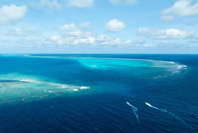 (251124) -- SOUTH CHINA SEA, Nov. 24, 2025 (Xinhua) -- An aerial drone photo shows the China Coast Guard (CCG) conducting law enforcement patrols in the territorial waters of China's Huangyan Dao and surrounding areas on Nov. 14, 2025. (Xinhua/Bei He)