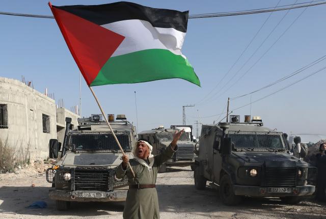 (251125) -- BEIJING, Nov. 25, 2025 (Xinhua) -- A Palestinian man demonstrates demanding to return to Nur Shams camp, east of Tulkarm city, in the northern West Bank, on Nov. 23, 2025. Dozens of displaced people from Nur Shams camp gathered here to demand return to their homes. (Photo by Nidal Eshtayeh/Xinhua)