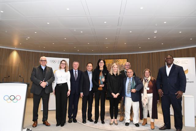 (251125) -- LAUSANNE, Nov. 25, 2025 (Xinhua) -- Chinese volleyball coach Lang Ping (5th L) and Cuba's wrestling coach Raul de Jesus Trujillo Diaz (3rd R) pose with IOC President Kirsty Coventry (5th R) and other guests at the Olympic House in Lausanne, Switzerland, Nov. 24, 2025. The International Olympic Committee (IOC) on Monday honored Chinese volleyball coach Lang Ping and Cuban wrestling coach Raul de Jesus Trujillo Diaz with the IOC Coaches Lifetime Achievement Awards. (Xinhua/Lian Yi)
