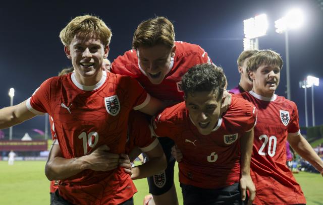 (251125) -- DOHA, Nov. 25, 2025 (Xinhua) -- Johannes Moser (1st L) of Austria celebrates with his teammates after scoring during the semifinal match between Austria and Italy at the FIFA U17 World Cup 2025 in Doha, Qatar, on Nov. 24, 2025. (Photo by Nikku/Xinhua)