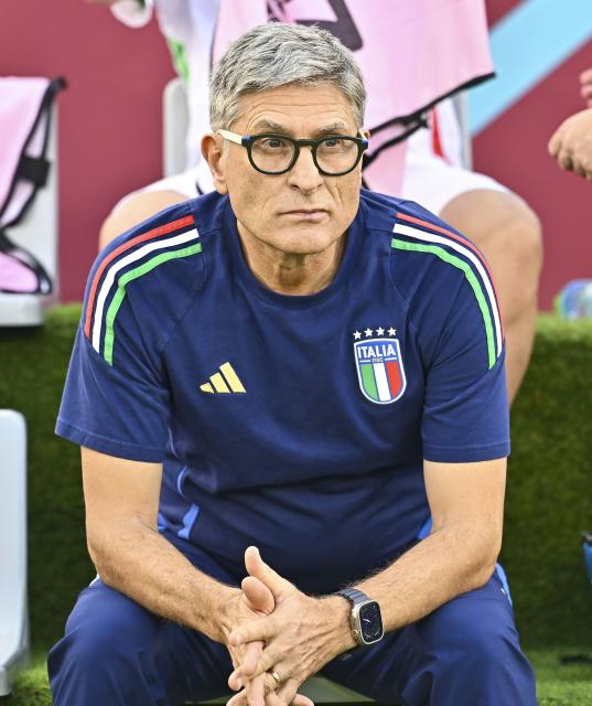 (251125) -- DOHA, Nov. 25, 2025 (Xinhua) -- Italy's head coach Massimiliano Favo looks on prior to the semifinal match between Austria and Italy at the FIFA U17 World Cup 2025 in Doha, Qatar, on Nov. 24, 2025. (Photo by Nikku/Xinhua)