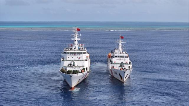(251125) -- SOUTH CHINA SEA, Nov. 25, 2025 (Xinhua) -- An aerial drone photo shows the China Coast Guard (CCG) patrolling in the territorial waters of China's Huangyan Dao and surrounding areas on Nov. 8, 2025. (Xinhua/Bei He)
